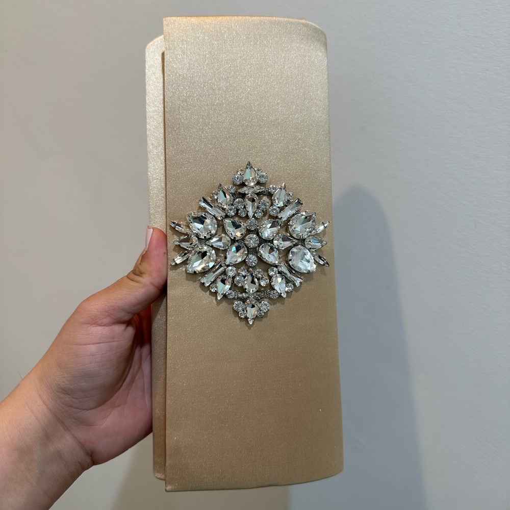 BRAND NEW WITH TAGS- Satin beige/cream clutch with metal straps included